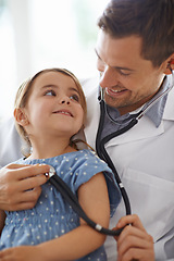 Image showing Child, doctor and stethoscope of pediatrician for healthcare consulting, check lungs and listening to heartbeat. Happy girl kid, man and chest for clinic consultation, medical analysis and assessment