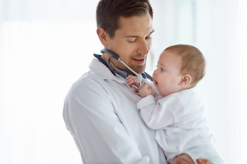 Image showing Man, pediatrician and baby playing with stethoscope for medical assessment, support or healthcare of children. Cute newborn, doctor and pediatrics in clinic, kids hospital and trust of expert mockup