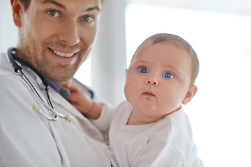 Image showing Portrait, pediatrician and holding baby in clinic assessment, medical support and growth. Newborn kids, happy man and pediatrics doctor in hospital for healthcare, consulting and wellness of children