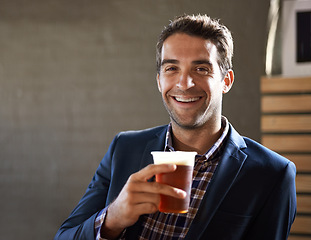 Image showing Business man at pub, smile with beer in portrait and relax, social time or event with professional person at bistro. Hospitality industry, male customer at restaurant and enjoying alcohol drink