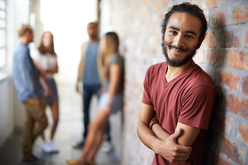 Image showing Education, university and happy portrait of man with smile for motivation, knowledge and learning. College, scholarship and face of male student with friends on campus for studying, class and school