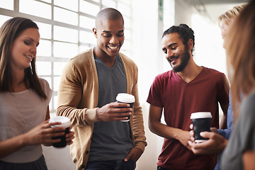 Image showing Coffee, talking and friends or happy students in a hallway for discussion, happiness or drink. Group of diversity men and women at campus or university for chat or conversation about education career