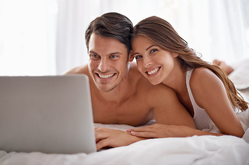 Image showing Love portrait, laptop and bedroom couple relax for morning peace, calm and streaming online Valentines Day movie. Smile, vacation holiday and romantic people bonding on hotel bed in Toronto Canada