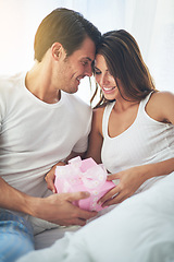 Image showing Man giving woman gift, love and happy with partnership, relationship and celebration on Valentines day date. Couple smile with present, luxury and commitment, gratitude and celebrate holiday