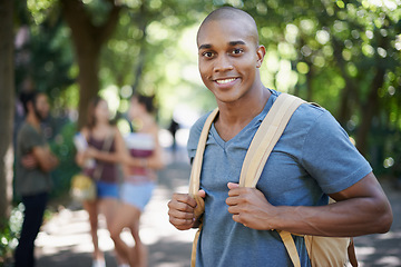 Image showing Man, student park and portrait with backpack by a campus nature with smile and ready for study. Happiness, young and African male face in college and university outdoor with education and school bag