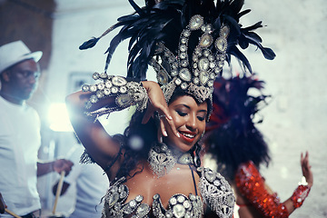 Image showing Festival, carnival and dancer woman in samba with smile, music and party celebration in Brazil. Mardi gras, dancing or culture event costume with a young female person with happiness from performance