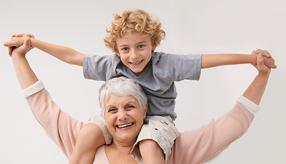 Image showing Portrait, piggyback or grandmother with a happy child or smile hugging with love in family home. Elderly grandma, boy or fun old woman relaxing, bonding or playing together in retirement on holiday