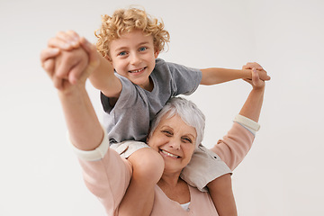 Image showing Airplane, portrait and grandmother with child embrace, happy and bonding against wall background. Love, face and senior woman with grandchild having fun playing, piggyback and enjoying game together