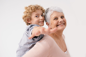 Image showing Portrait, piggyback or happy grandma with a playful child or smile hugging or smiling with love as a family together. Hand, boy or fun elderly grandmother relaxing, bonding or playing in retirement