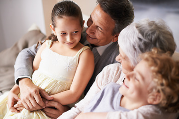 Image showing Smile, love or happy grandparents with children hug to embrace care together in family home in retirement. Elderly grandma, old man or kids siblings relaxing or bonding to enjoy quality time together