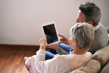 Image showing Tablet, mockup or old couple streaming movie or film on online subscription in retirement at home together. Screen, relaxing or back of senior woman loves watching fun videos with an elderly man