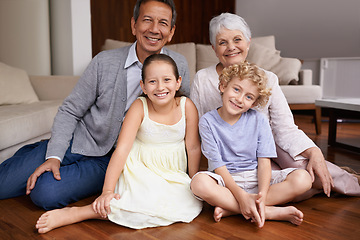 Image showing Portrait, floor or happy grandparents with kids sit smiling together in family home in retirement. Senior grandma, smile or children siblings relaxing or bonding to enjoy quality time with old man