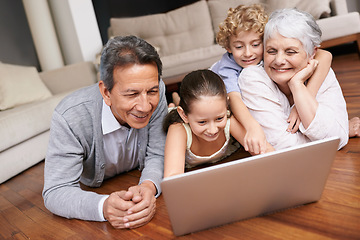 Image showing Laptop, floor or grandparents with happy kids for movie streaming online subscription in retirement at home. Children siblings, relax or grandmother watching videos on internet with a senior old man