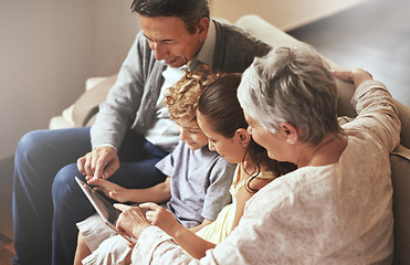 Image showing Tablet, children or grandparents streaming movie or film on online subscription in retirement at home together. Kids siblings, relaxing or grandmother loves watching fun videos with a senior old man