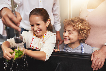 Image showing Food, washing or happy kids learning cooking skills for a healthy dinner with green vegetables at home. Kids learning, hands or young siblings cleaning diet meal for nutrition in kitchen with parents