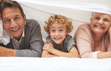 Image showing Portrait, grandparents or happy boy in bedroom to relax together for bonding in Australia with love at home. Morning, faces or grandmother with funny cute kid or old man to enjoy quality time on bed