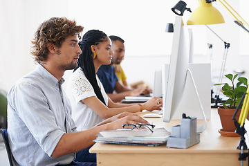 Image showing Journalist, people or man typing on computer working on email, digital business or research project. Laptop, database or serious employees writing online blog reports or internet article with focus