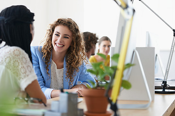 Image showing Funny, happy woman or business women on break talking, chatting or speaking of gossip news together. Bonding, friends laughing or relaxed employees in conversation or discussion about people at desk