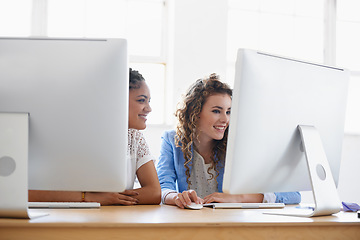 Image showing Women, computer or happy people in office talking, chatting or speaking of gossip or online news together. Internet, smile or friends in conversation or discussion about on blog or article at desk