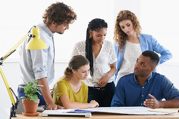 Image showing Business people, blueprint and meeting in teamwork construction, planning or collaboration at the office. Architect group working on paperwork for architecture project or floor plan at the workplace