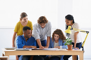 Image showing Businessman, coaching and writing on document for planning, team strategy or training staff at office. Business people listening to coach in teamwork for group project, paperwork or plan at workplace