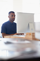 Image showing Journalist, office or black man with computer to research news, online business or digital project. Focus, database or serious employee writing blog reports or internet article on pc or laptop desk