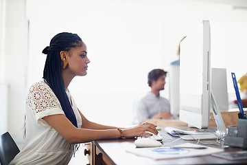 Image showing Journalist, online or girl typing on computer working on email, digital business or research project. Laptop, database or serious biracial woman writing blog reports or internet article with focus