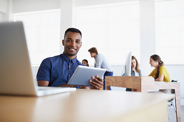 Image showing Business, portrait or black man reading on tablet working on digital marketing or social media strategy in office. Smile, technology or happy employee researching online info or content on internet