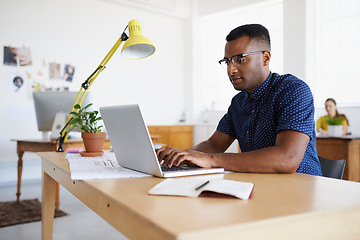 Image showing Journalist, serious or black man typing on laptop working on email, business project or online research. Computer, digital agency or focused worker copywriting on blog, reports or internet article