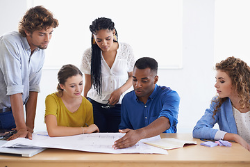 Image showing Creative business people, blueprint and planning for architecture or construction on office desk. Architect group working or discussing project or floor plan in team collaboration meeting for startup