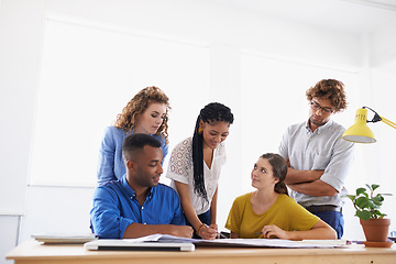 Image showing Diversity, business people and writing in team project, planning or strategy together at office. Group of diverse employees working on paperwork, documents or teamwork for brainstorming at workplace