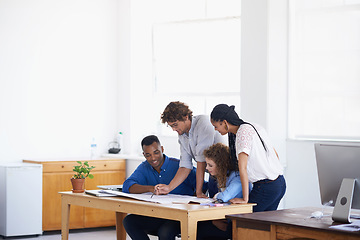 Image showing Businessman, coaching and document in team planning, strategy or training staff at the office. Business people with coach or paperwork in teamwork for group project plan or brainstorming at workplace