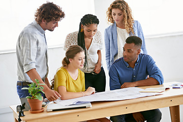 Image showing Creative business people, blueprint and planning in meeting for architecture or construction on office desk. Architect group in project discussion with floor plan in team collaboration for startup