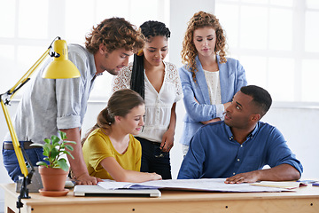 Image showing Diversity, business people and blueprint in meeting for brainstorming, planning or sharing ideas at office. Architect group discussing document or floor plan strategy for construction at workplace