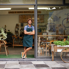 Image showing Smile, coffee shop and thinking with man as small business owner at front door. Happy entrepreneur person as barista, manager or waiter in restaurant for welcome idea, career pride and startup goals