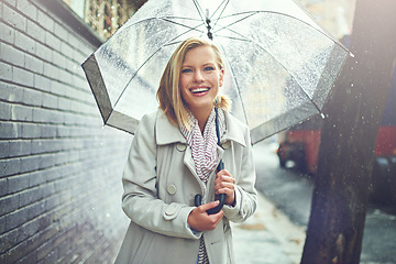 Image showing Rain umbrella, city street portrait and woman with happiness on a sidewalk from winter weather. Happy female person, raining and travel on urban road outdoor in New York holiday with freedom and joy