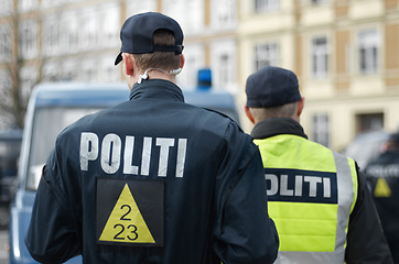 Image showing Law enforcement, guard and security with police officer in city for peace, safety and authority. Emergency services, justice and protection with person in street for help, order and arrest