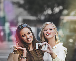 Image showing Happiness, urban selfie and shopping people, friends or city women with picture memory of fashion, apparel or designer clothes. Black Friday deal, trendy boutique and person post to social media