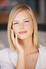 Image showing Portrait, beauty and a woman with hands on face for natural makeup, cosmetics and glow on skin. Female model person from Canada for self care, skincare and confidence for dermatology headshot