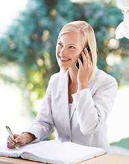 Image showing Woman, phone call and receptionist taking notes at desk, smile and speaking to contact. Thinking, notebook and female secretary with cellphone for booking, writing and conversation at hotel.