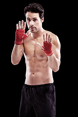 Image showing Model, boxer and hands in portrait dark background for training workout for fight at the gym. Kick boxing, professional and focus train with motivation for exercise at the gym for a competition.