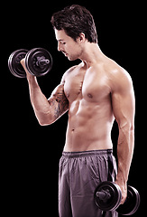 Image showing Strong man, dumbbell and workout on black background, dark studio and energy for sexy six pack abs. Bodybuilder, sports athlete and curling biceps with weights for fitness, exercise and muscle growth