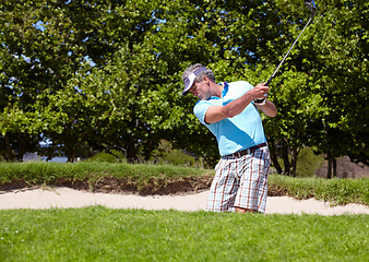 Image showing Golf course, sports and elderly man with driver swing outdoors for fitness, training and practice. Golfing, club and senior male golfer enjoying retirement with active, hobby and exercise outside