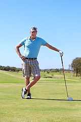 Image showing Portrait, golf and old man with driver on a field for training, hobby and sports on blue sky background. Sports, face and active senior male golfer outdoor for retirement, fitness or practice game