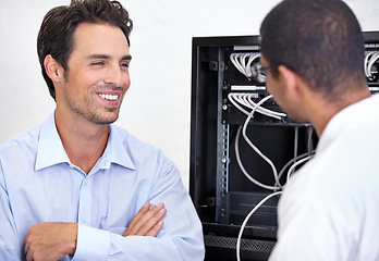 Image showing Server room, it support and network with an engineer talking to a business man about cyber security. Database, consulting and maintenance with a technician chatting about information technology