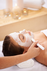 Image showing Cream, spa and woman with a face mask, dermatology and treatment for acne, skincare and grooming. Female person, model and girl with a brush, creme and organic facial with wellness, beauty and health