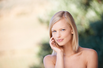 Image showing Portrait, beauty and a woman outdoor in nature for natural makeup, dermatology and cosmetics. Face of female model happy with green or sustainable skincare, facial self care and healthy skin glow