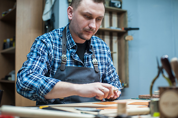 Image showing Concept of handmade craft production of leather goods.