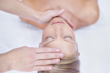 Image showing Relax, acupressure and facial massage, woman in beauty salon for health, wellness and luxury treatment with eyes closed. Spa, professional skin care therapist hands on healthy face of girl from above