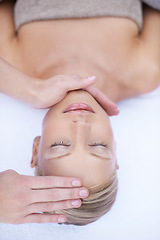 Image showing Relax, reiki and facial massage, woman in spa for health, wellness and luxury treatment with eyes closed. Beauty salon, professional skin care therapist with hands on healthy face of girl from above.